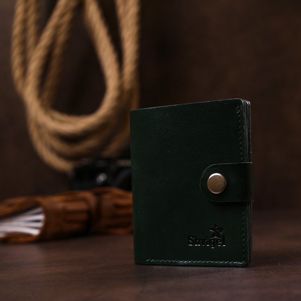Стильний невеликий гаманець зеленого кольору з натуральної гладкої шкіри Shvigel (2416483)