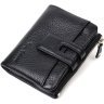 Практичний жіночий гаманець із натуральної шкіри чорного кольору з хлястиком на кнопці Tony Bellucci (2422060) - 1