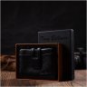 Практичний жіночий гаманець із натуральної шкіри чорного кольору з хлястиком на кнопці Tony Bellucci (2422060) - 9