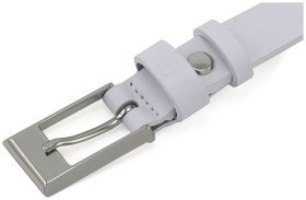 Шкіряний жіночий ремінь вузького типу в білому кольорі Grande Pelle 23100