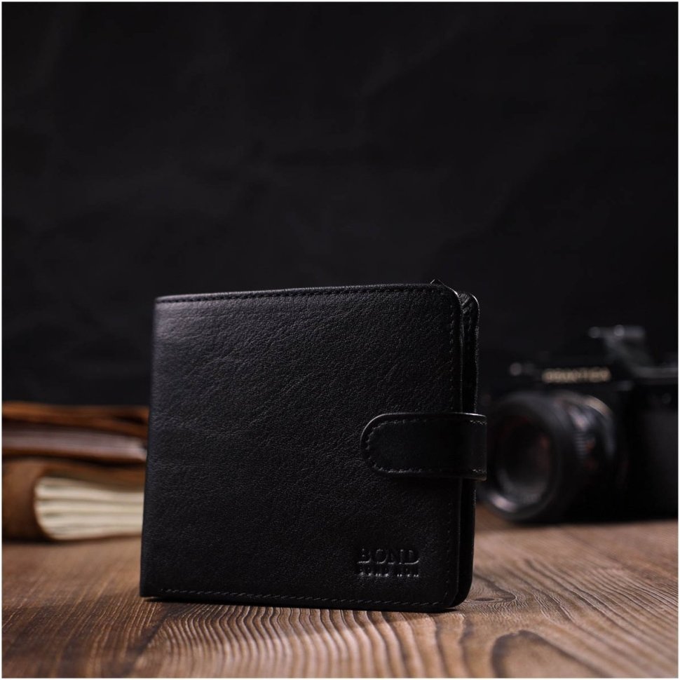 Зручний чоловічий гаманець із натуральної шкіри класичного чорного кольору на кнопці BOND (2422062)