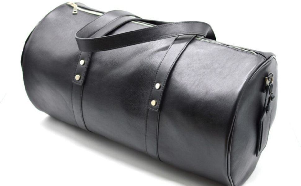 Дорожня сумка-барильце з натуральної шкіри чорного кольору TARWA (19949)