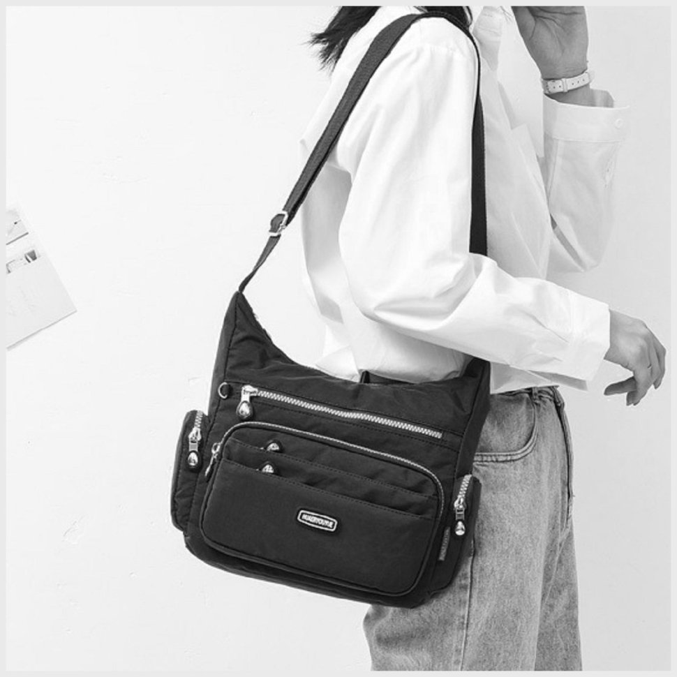 Середня жіноча сумка через плече із чорного текстилю Confident 77583
