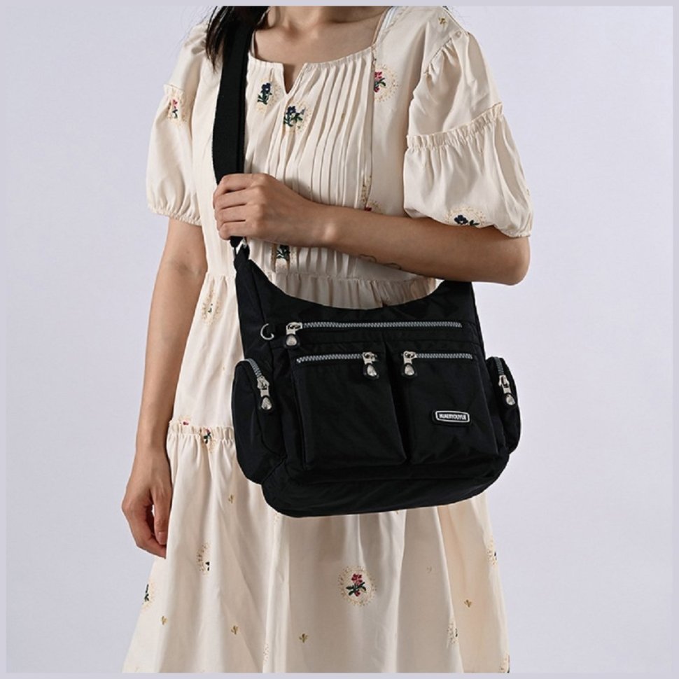 Жіноча сумка з чорного текстилю з однією лямкою на плече Confident 77585