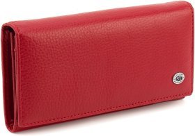 Шкіряний жіночий гаманець червоного кольору з клапаном на кнопці ST Leather 1767391