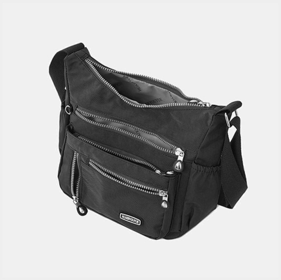 Жіноча тканинна сумка-месенджер чорного кольору через плече Confident 77591