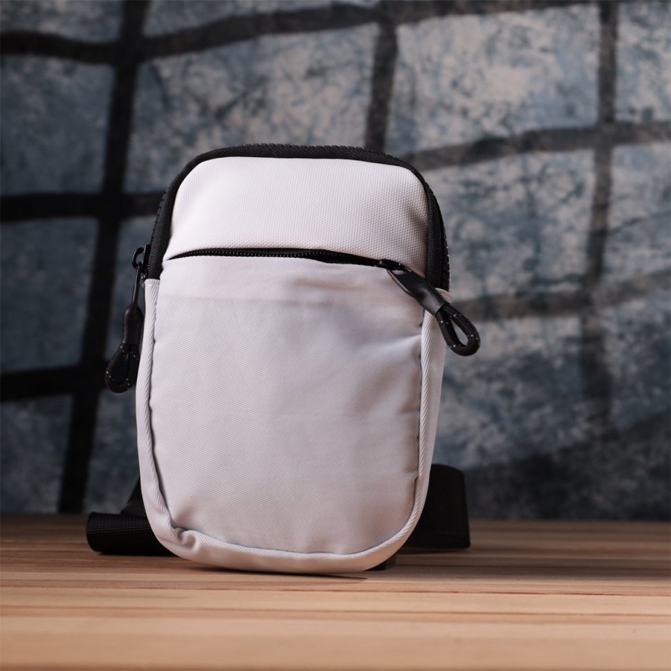 Компактная текстильная слинг-сумка белого цвета для путешествий Vintage 2422867 modnotak фото №8