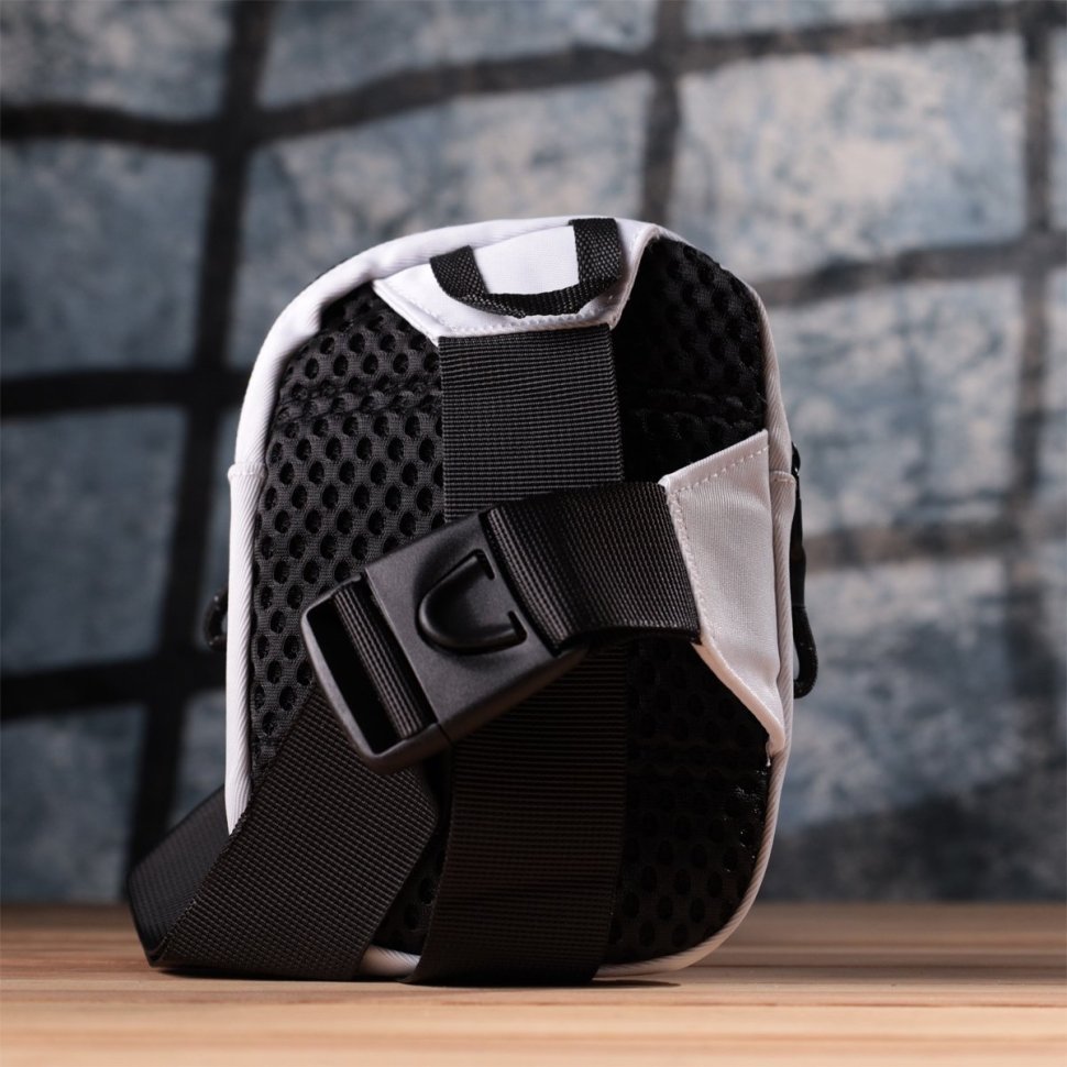 Компактная текстильная слинг-сумка белого цвета для путешествий Vintage 2422867 modnotak фото №9