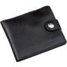 Шкіряне чоловіче портмоне чорного кольору з хлястиком на кнопці SHVIGEL (2416211) - 1