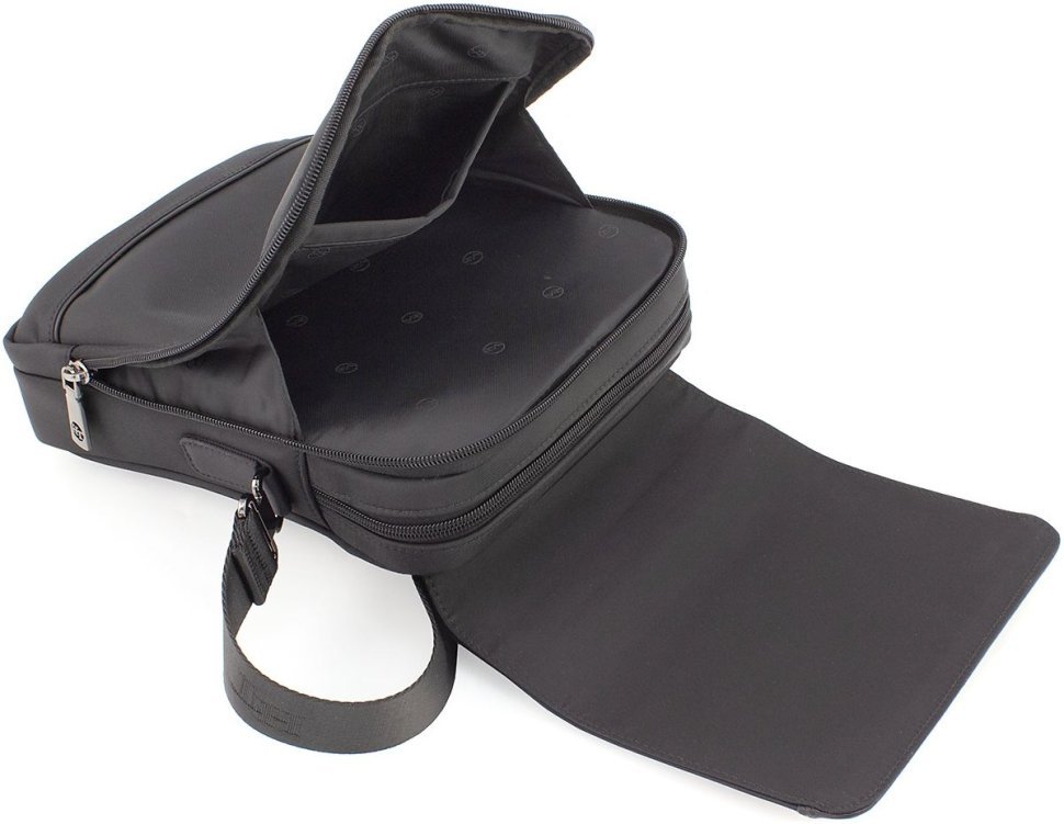 Невелика текстильна чоловіча сумка чорного кольору через плече H.T. Leather (64294)