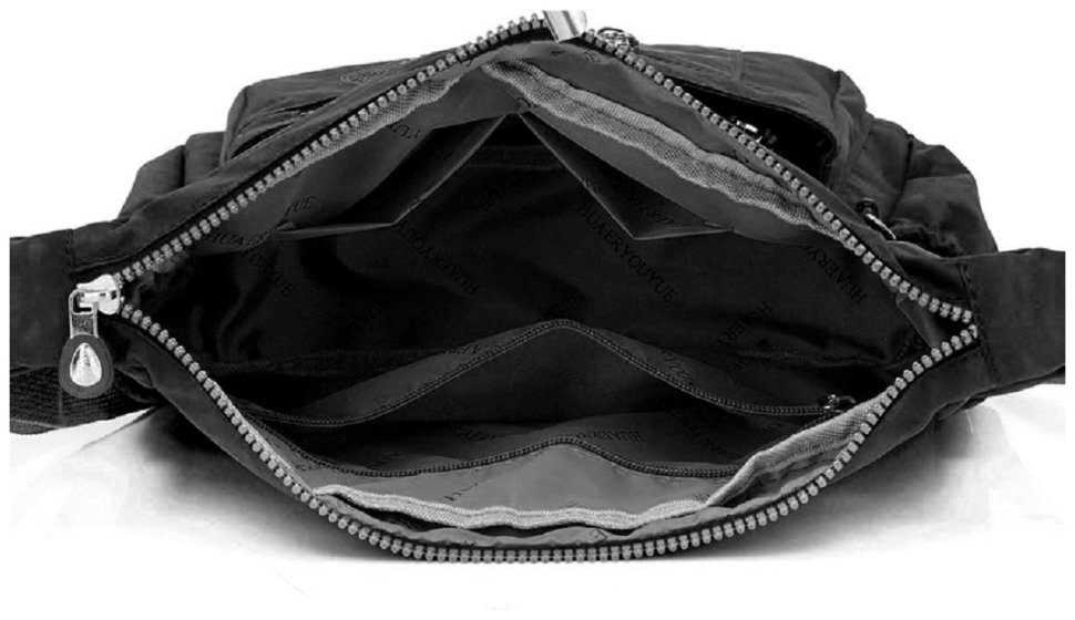 Простора жіноча сумка-месенджер чорного кольору з текстилю Confident 77594
